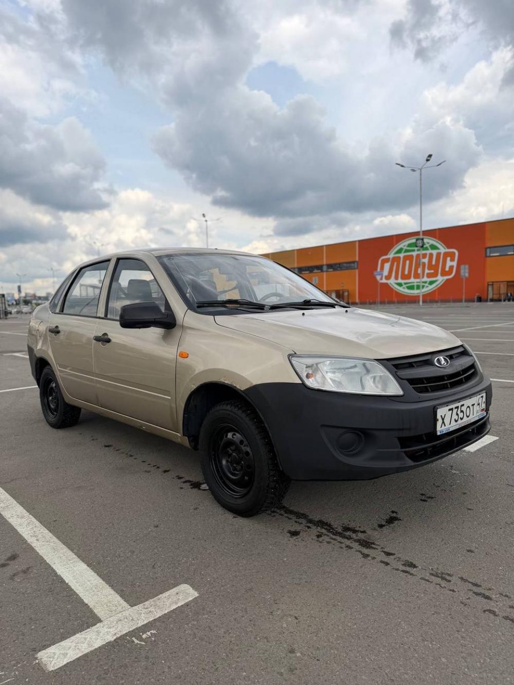 Фото автомобиля LADA 2190 GRANTA, 2013. Цвет: СЕРЕБРИСТО-БЕЖЕВЫЙ