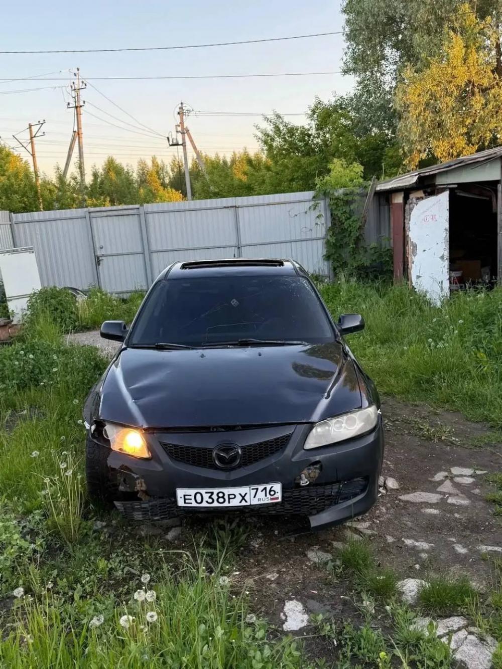 Проверка по номеру Е038РХ716 — Mazda
