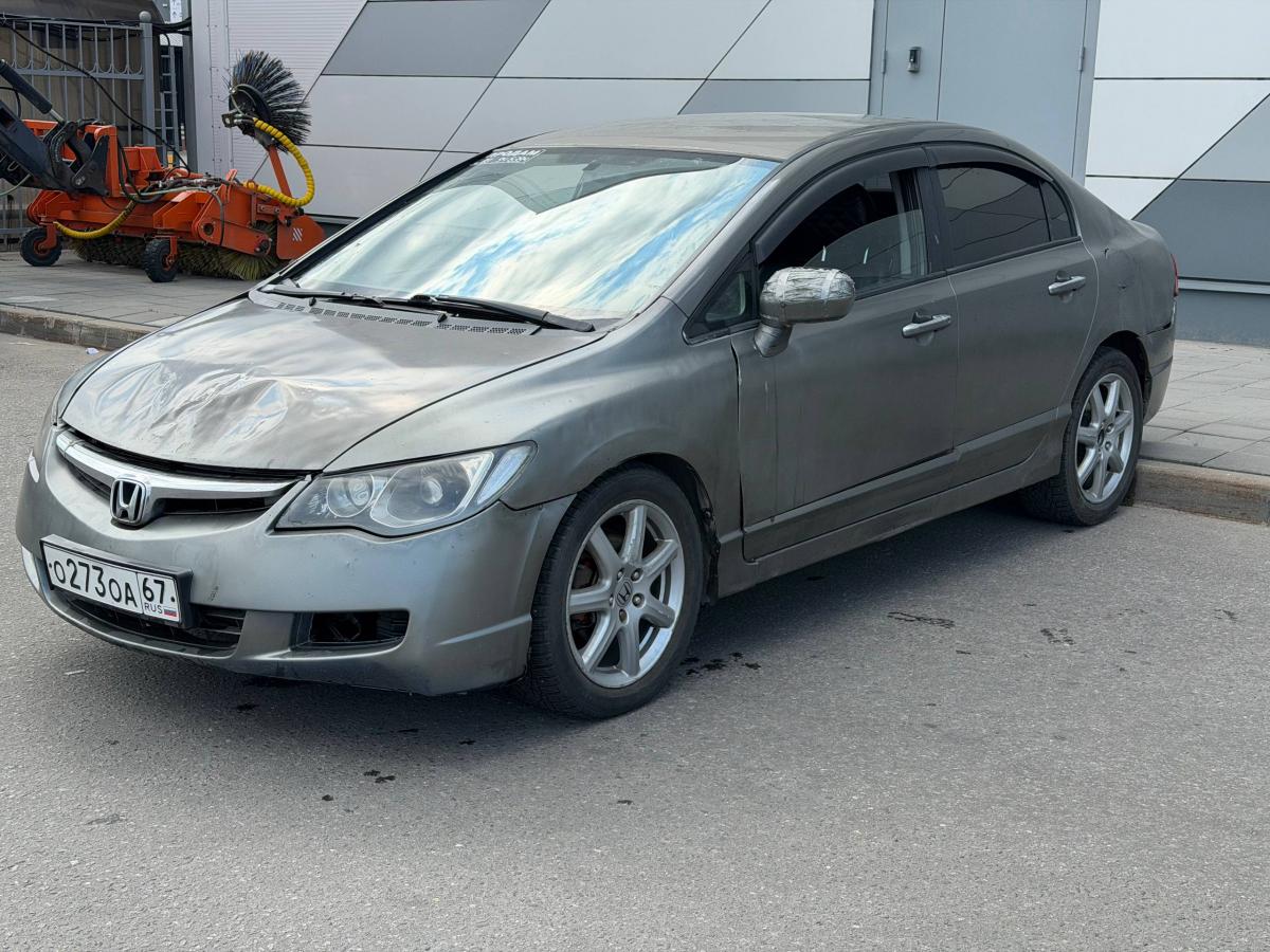 Honda с госномером О273ОА67