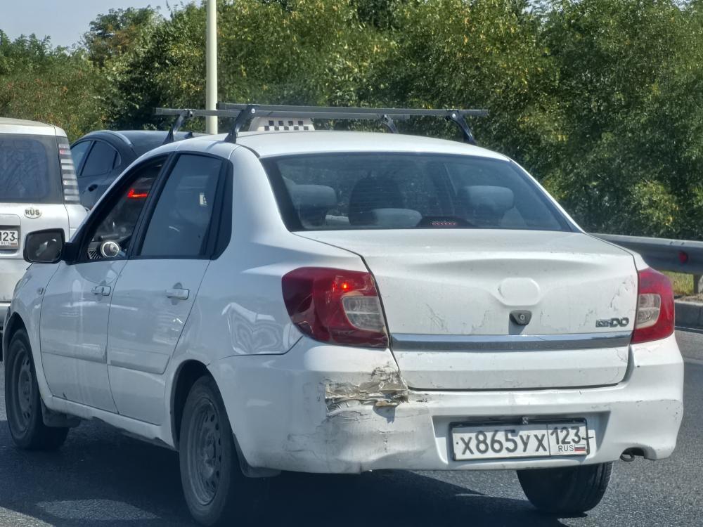 Datsun с госномером Х865УХ123